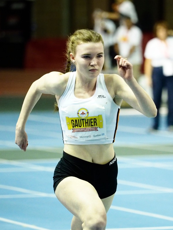 Alexe Gauthier en action lors des préliminaires du 60 mètres féminin. (Photo : Louis-Olivier Brassard)